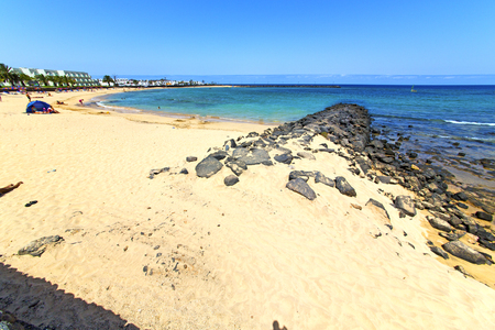 white coast lanzarote  in spain   beach  stone water  and summerの写真素材
