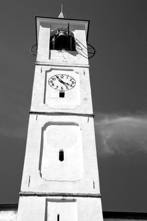ancien clock tower in italy europe old  stone   and bellの写真素材