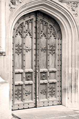 parliament in london old church door and marble antique  wallの写真素材
