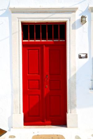 door      in antique village santorini greece europe   and white wallの写真素材