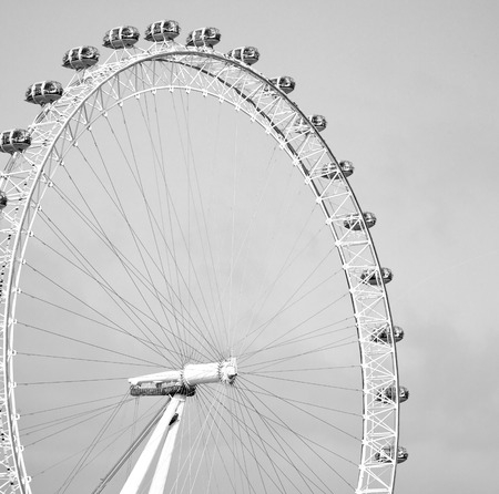 london eye in the spring sky and white cloudsのeditorial素材