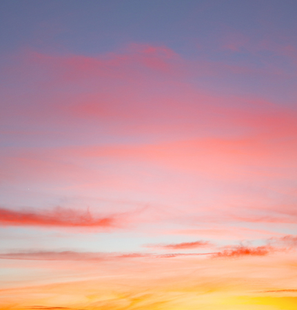sunrise in the colored sky white soft clouds and abstract background