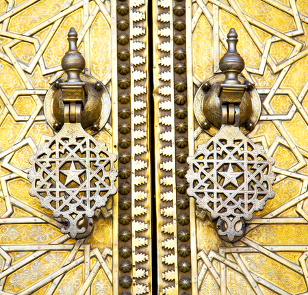 metal brown    morocco in    africa the old wood  facade home and rusty safe padlockの写真素材