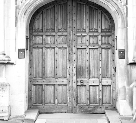 parliament in london old church door and marble antique  wall