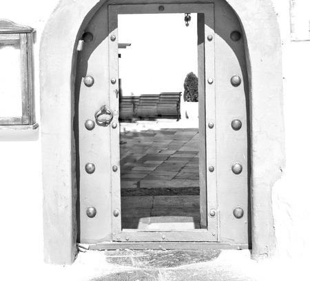 door      in antique village santorini greece europe   and white wallの写真素材