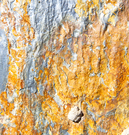 rocks stone and red orange gneiss in the wall of morocco