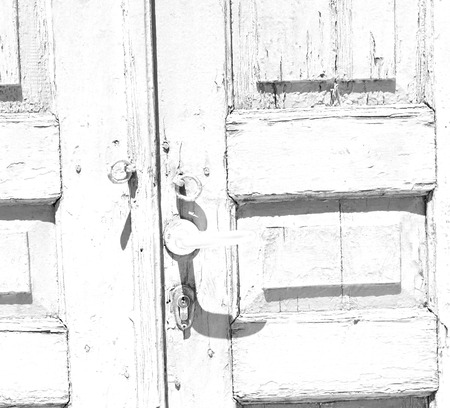 door  in italy old ancian wood and traditional               texture nailの写真素材