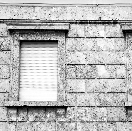 in europe italy milan old architecture and venetian blind wallの写真素材