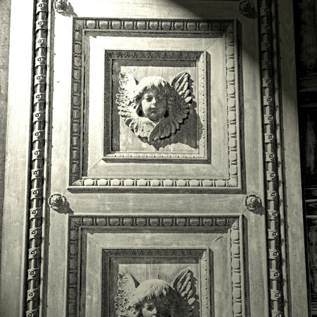 abstract angel   texture of a     brown  antique wooden     old doorの写真素材