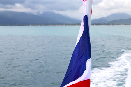 asia myanmar kho samui bay isle waving flag    in thailand and south china seaの写真素材