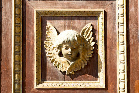 abstract angel   texture of a     brown  antique wooden     old doorの写真素材
