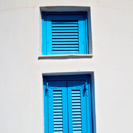 in santorini europe greece  old architecture and venetian blind wall