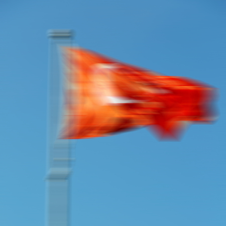 waving flag in the blue sky world  colour and wave