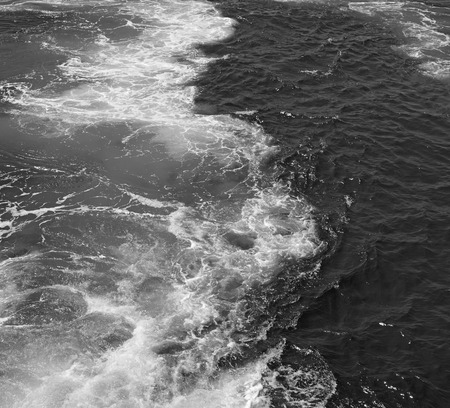 foam   and froth in the  sea      of mediterranean greece