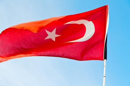 waving flag in the blue sky  morocco    colour and waveの写真素材