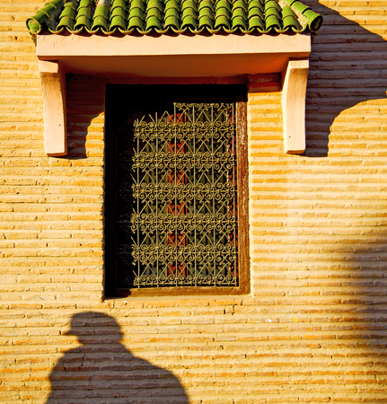 window in morocco africa and old construction wal brick historicalの写真素材