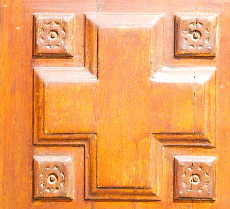 texture of a brown old door in italy europeの写真素材