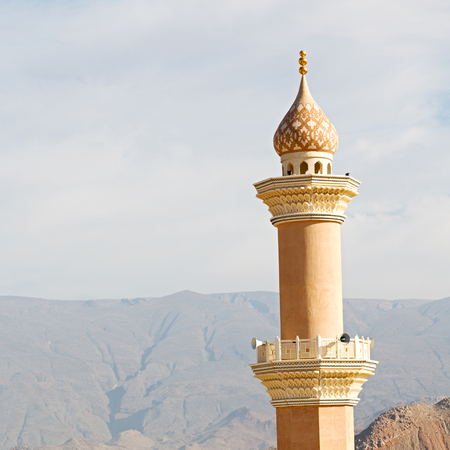 minaret and religion in clear sky in oman muscat the old mosqueの写真素材