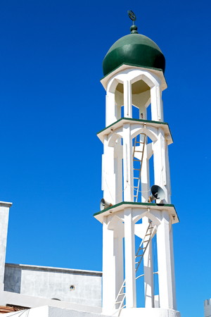 minaret and religion in clear sky in oman muscat the old mosqueの写真素材