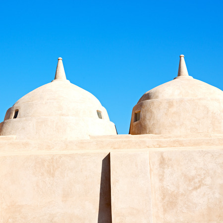 minaret and religion in clear sky in oman muscat the old mosqueの写真素材