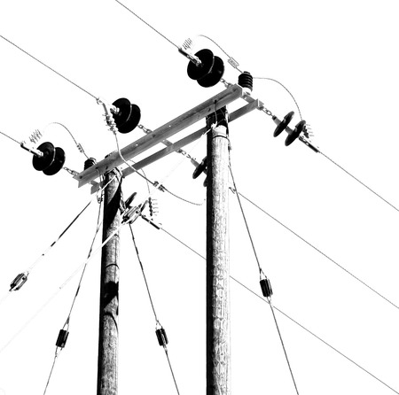 wood pylon energy and current line   in oman the electric cable