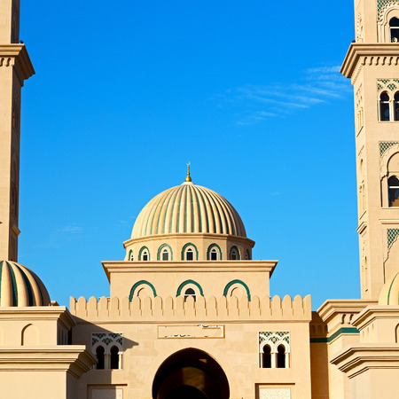 minaret and religion in clear sky in oman muscat the old mosqueの写真素材