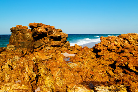 relax near sky in oman coastline sea ocean  gulf rock and beach
