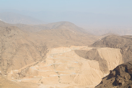 gorge and canyon the deep cloudy sky   in oman the old  mountainの写真素材