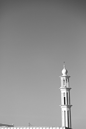 minaret and religion in clear sky in oman muscat the old mosqueの写真素材