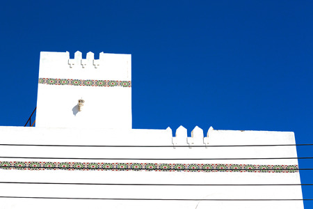 in oman new house brick building    the city backgroun skyの写真素材