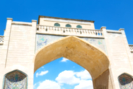 blur in iran shiraz the old gate arch historic entrance for the old city and nature flowerの写真素材