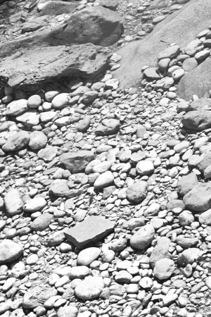 oman  old river and stone flowing water near the sea