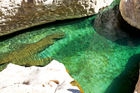 oman old mountain and water in canyon wadi oasi nature paradiseの写真素材