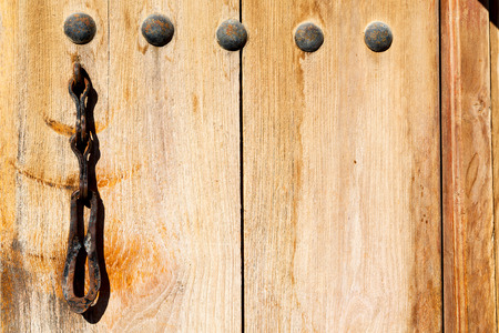 in oman antique door entrance and      decorative handle for background