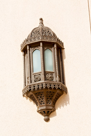and abstract background in oman old streetlamp in the wallの写真素材