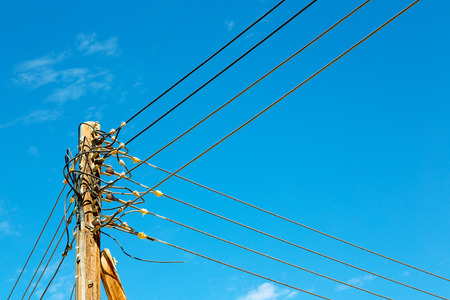 wood pylon energy and current line   in oman the electric cableの写真素材