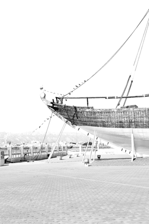 in oman old boat in the sidewalk near the seaのeditorial素材