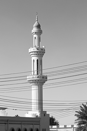 minaret and religion in clear sky in oman muscat the old mosqueの写真素材