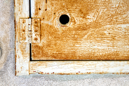 abstract  steel  padock in a   closed rusty metal pattern door   varese italy sumiragoのeditorial素材
