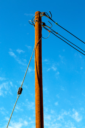 wood pylon energy and current line   in oman the electric cableの写真素材