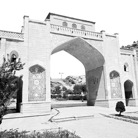 in iran shiraz the old gate arch historic entrance for the old city and nature flowerの写真素材