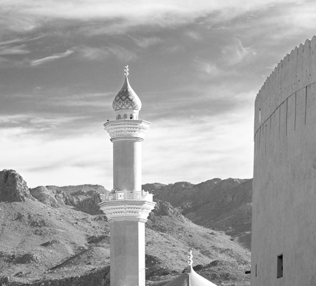 minaret and religion in clear sky in oman muscat the old mosqueの写真素材