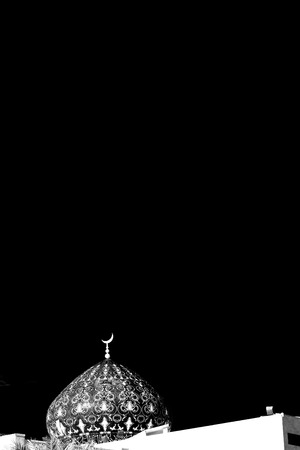 minaret and religion in clear sky in oman muscat the old mosqueの写真素材