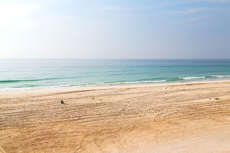 near sandy beach sky     and mountain in oman arabic seaのeditorial素材