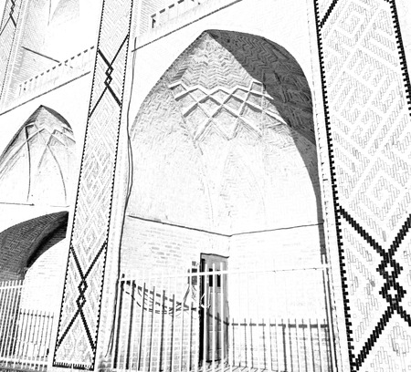 in iran the old mosque and traditional wall tile incision near minaretの写真素材