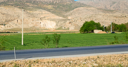 in iran blur mountain and landscape from the window  of a car