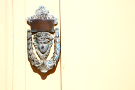 blur in iran antique door entrance and      decorative handle for backgroundの写真素材