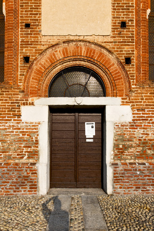 church  in  the   parabiago closed brick tower sidewalk italy  lombardy     oldのeditorial素材