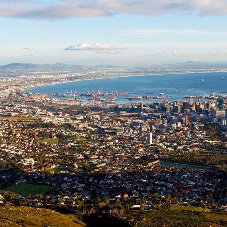 in south africa cape town city skyline from table mountain sky ocean and houseの写真素材