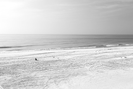 near sandy beach sky     and mountain in oman arabic seaの写真素材